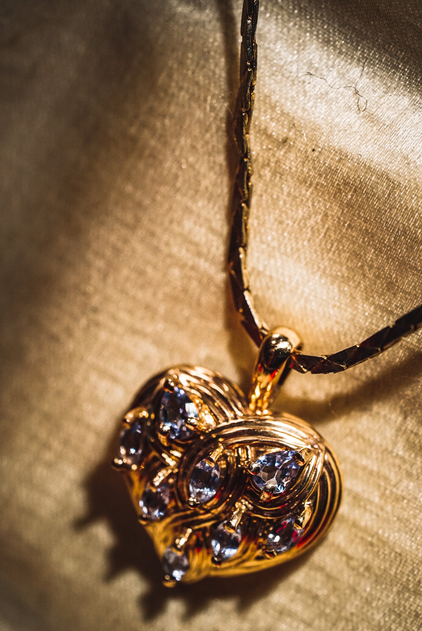 Sparkling Filigree Heart Pendant with Tanzanites