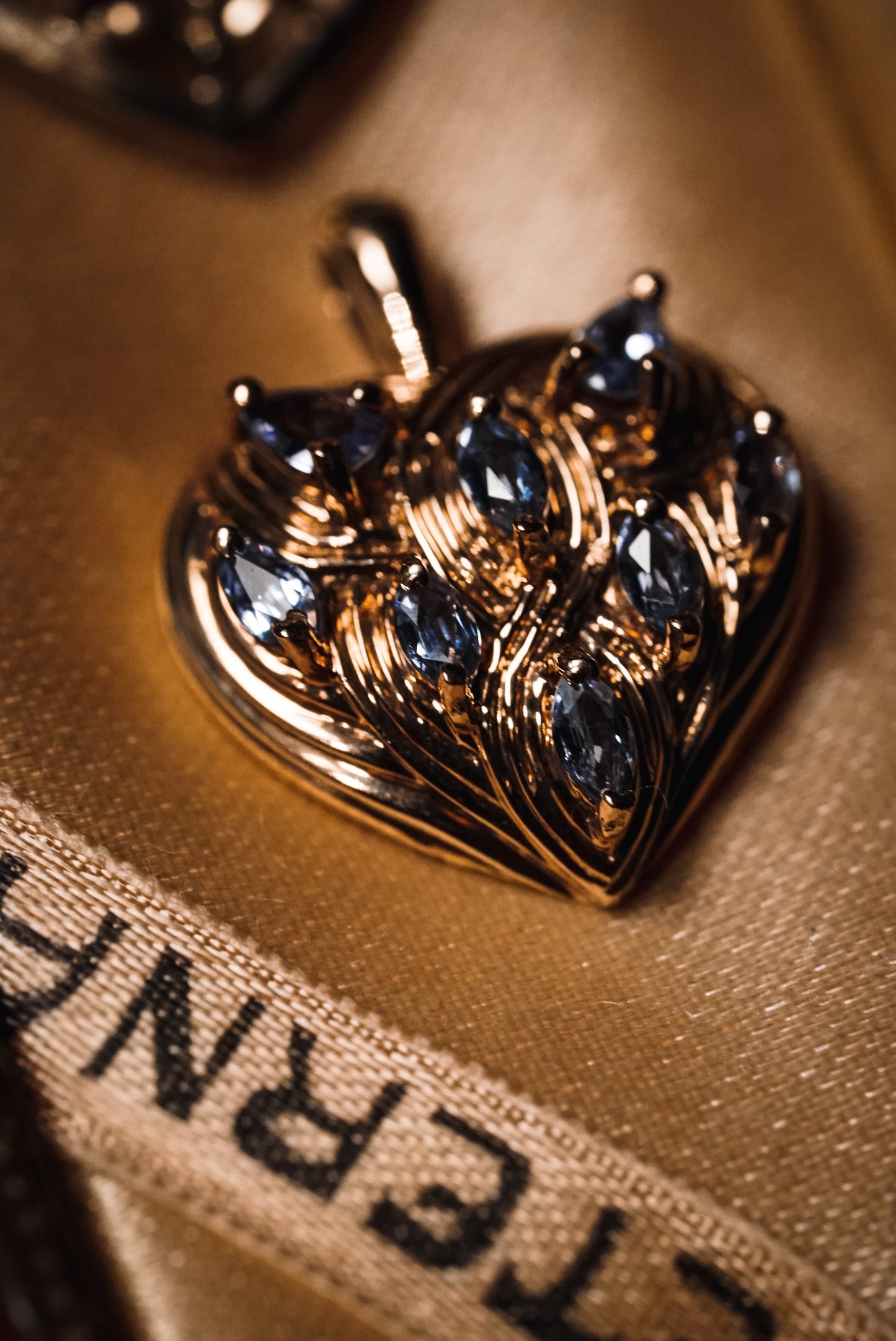 Sparkling Filigree Heart Pendant with Tanzanites