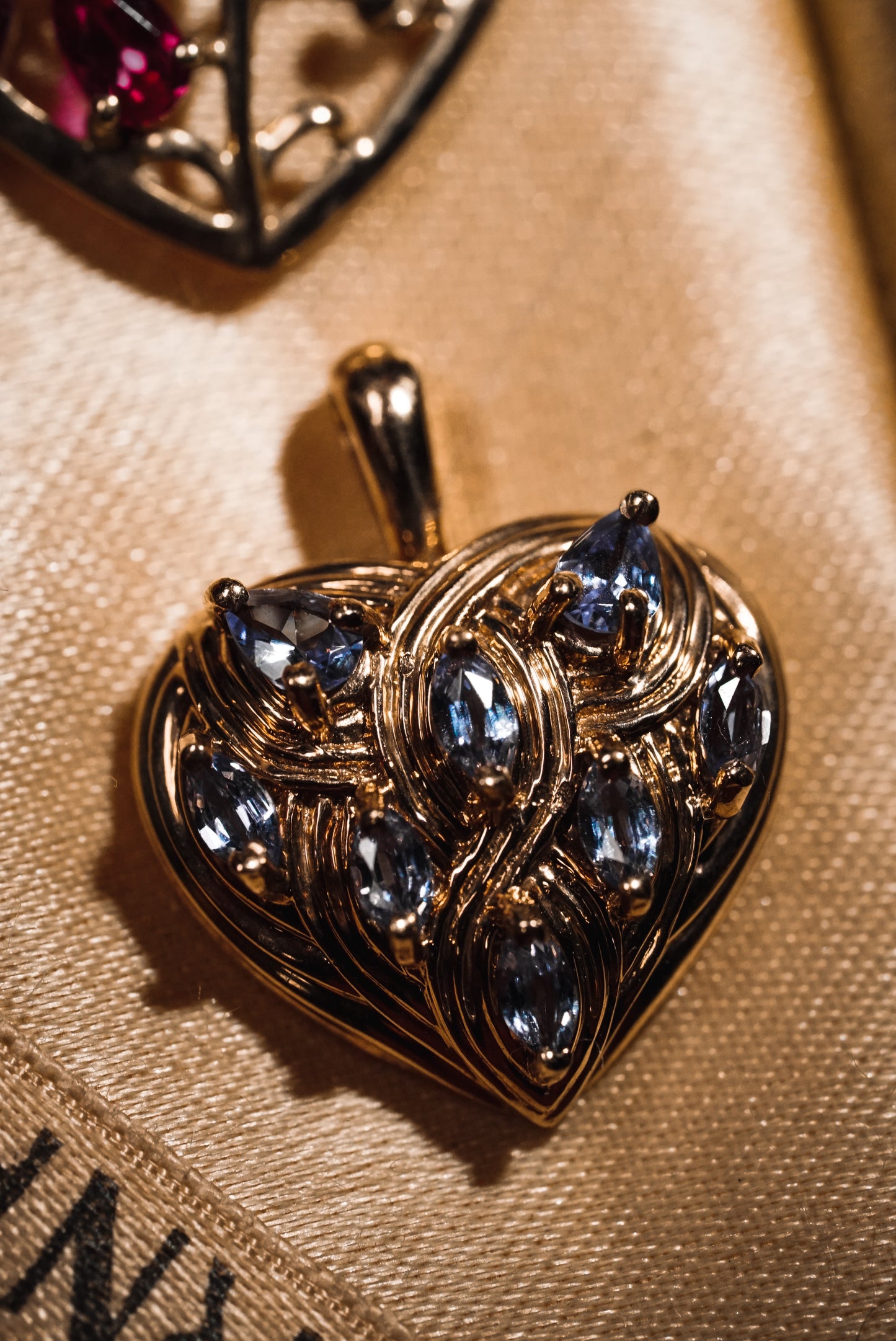 Sparkling Filigree Heart Pendant with Tanzanites